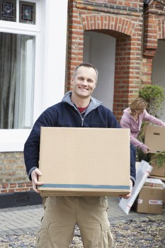Moving van and packed boxes for a Towerhill home removal