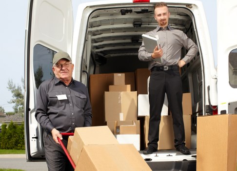 Loading household items into a removals van near Towerhill