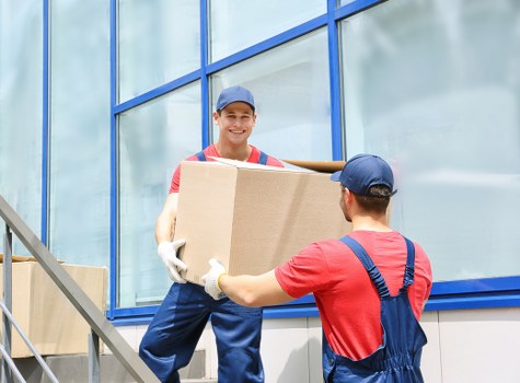 Packed boxes and furniture ready for a Towerhill home removal service