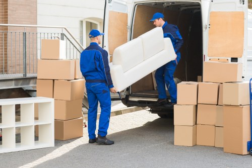 Towerhill moving truck transporting boxed household items