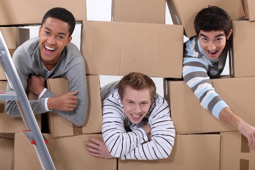 Removalists transporting furniture from a Towerhill property