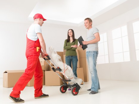 Careful handling of household items during packing services in Towerhill