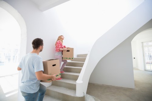 Boxes and furniture ready for transport in a Towerhill property