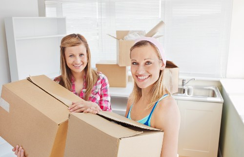 Packed office boxes and desks ready for relocation in Towerhill
