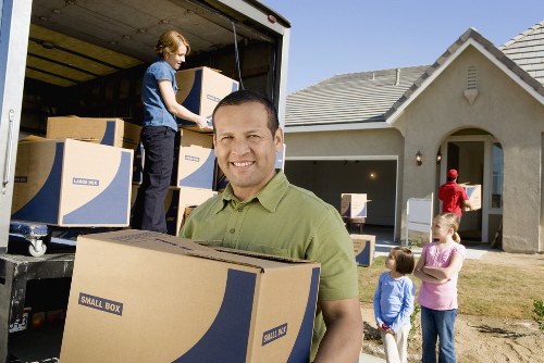 Careful packing of fragile household items for a Towerhill move